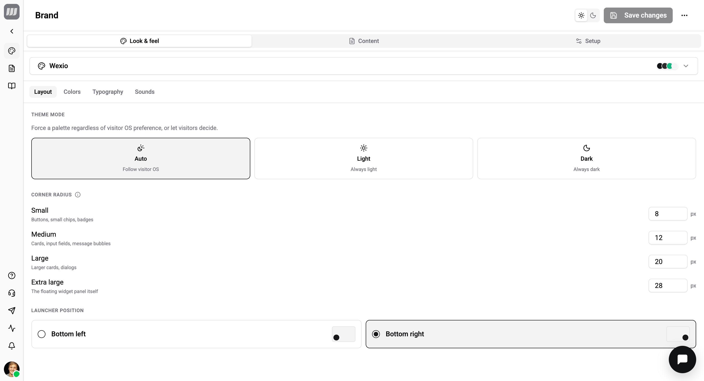 Brand editor — settings on the page with the live widget preview floating in the corner; header with light/dark toggle, Save changes, and the overflow menu